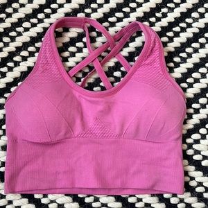 hot pink strappy sports bra